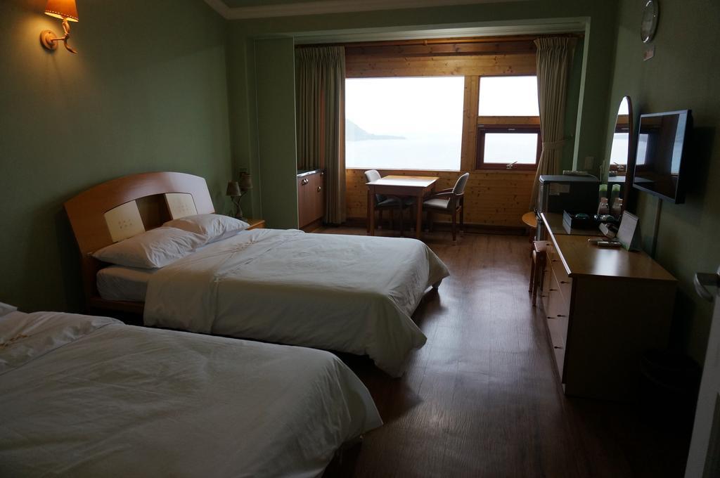 Park Beach Hotel Jeju by Rom bilde