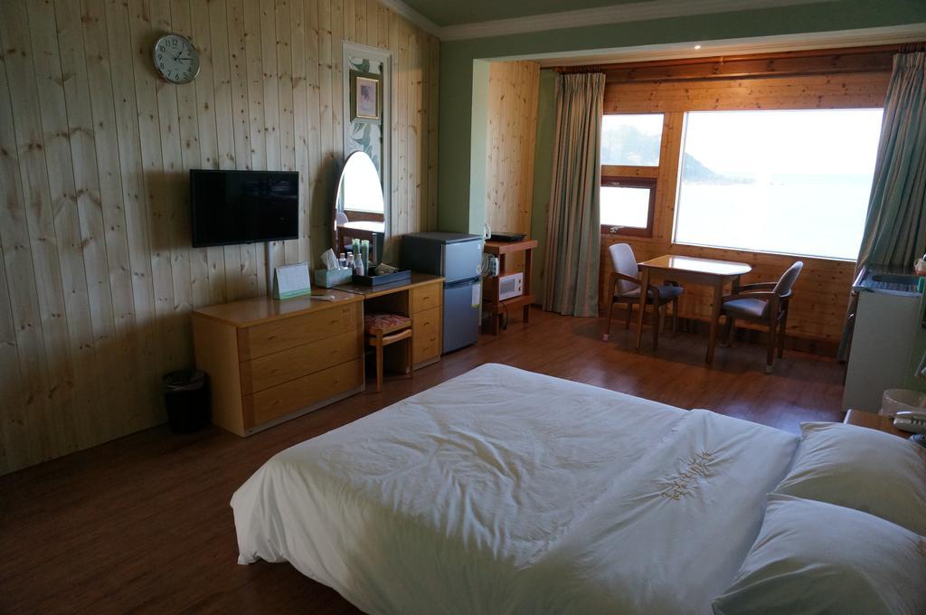 Park Beach Hotel Jeju by Rom bilde